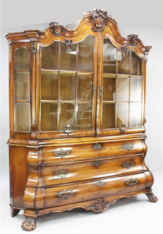 A late 18th / early 19th century Dutch bombe shaped mahogany bookcase, W.6ft 5.5in.